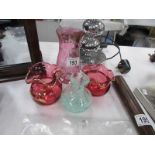 A contemporary cranberry glass milk jug and sugar basin, an etched vase and a small art glass vase.