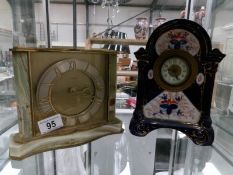 A ceramic clock and an onyx clock.