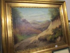 A large gilt framed oil on canvas mountain scene, signed V LcLozzel, 1919.