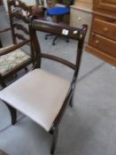 A mahogany dining chair