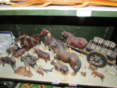 A shelf of horses including horse and dray