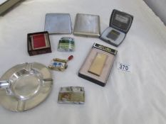 A mixed lot of tobacco related items including cigarette cases,