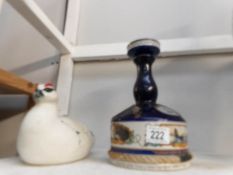 A Scottish pottery wild fowl and a Trafalgar Navy rum decanter