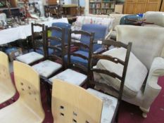 A set of 4 ladder back chairs