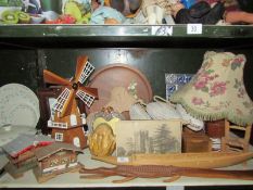 A shelf of miscellaneous wooden items