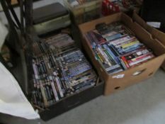 A large collection of DVD's in 2 boxes including many James Bond