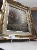 A gilt framed oil on canvas of a village inn/pub,