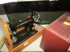 A cased Singer sewing machine