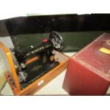 A cased Singer sewing machine