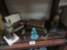 A mixed lot including Egyptian cat, Buddha,