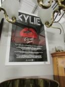 A framed and glazed Kylie poster