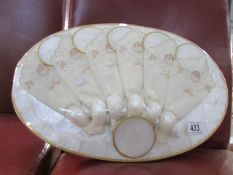 A shell and linen table feature
