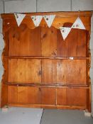 A pine dresser back/wall rack