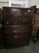 An oak cupboard on chest
