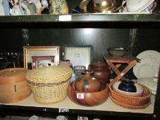 A shelf of assorted wooden items,