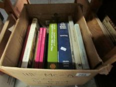 A box of books including Monarchy, Royal Family,
