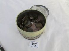 A tin of mixed UK coins