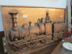 A large steam train plaque