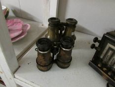 A pair of brass 'The Liverpool' binoculars and one other
