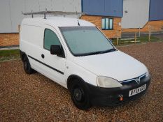 A white Vauxhall Combo 1.