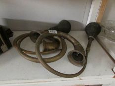 3 brass car horns,