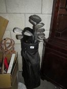 A golf bag and clubs