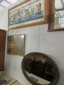 An oval mirror and 2 pictures