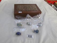 A jewellery box with key containing 5 miniature cloissonne vases