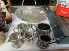 A mixed lot of silver plate including fruit dish, jugs,