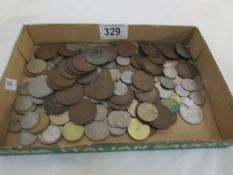 A mixed lot of UK and foreign coins