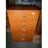 A pair of 5 drawer chests