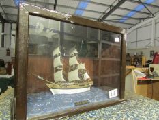 A cased model of HMS Bounty