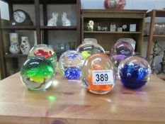 7 glass paperweights
