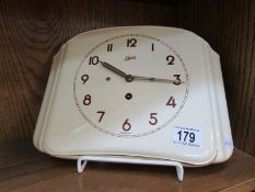 A 1950's Schatz pottery wall clock,