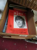A quantity of football programmes and footballer autograph books