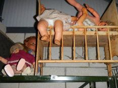 A dolls cot and dolls