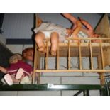 A dolls cot and dolls