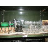 A shelf of assorted glass ware etc