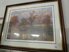 A framed and glazed canal scene