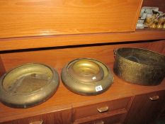A quantity of metal bowls
