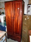 A mahogany effect wardrobe