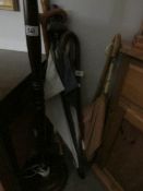 A mixed lot of walking sticks and canes