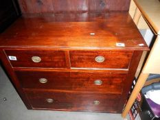 A 2 over 2 chest of drawers