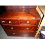 A 2 over 2 chest of drawers