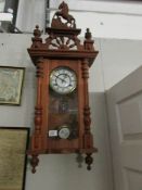 A mahogany wall clock