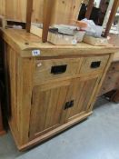 A rustic pine sideboard