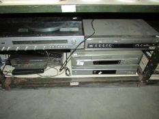 A shelf of Video recorders,