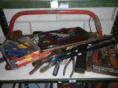 A shelf of assorted tools