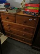 A pine 2 over 3 chest of drawers