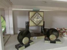 A French art deco marble clock garniture, (spring ok but nearly wound to the limit,